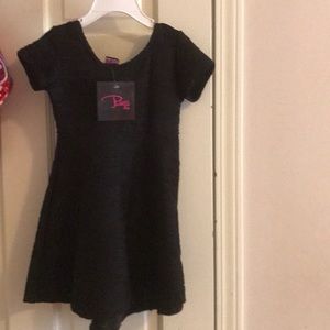 Black hi lo dessert with swirls